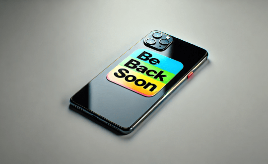 Smartphone with Be Back Soon sticker on back.