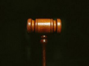 Photo of a gavel as OpenAI launches a legal counteroffensive against one of its co-founders, Elon Musk, and his competing AI venture, xAI.