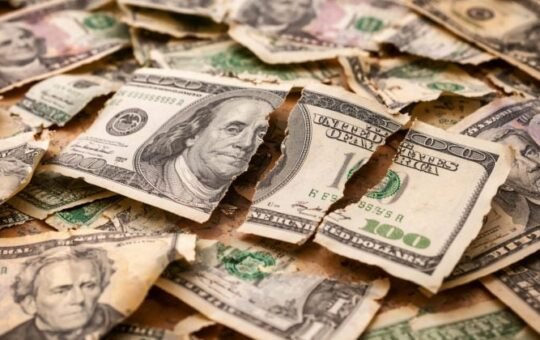 US dollar slides toward steepest weekly drop in seven months on policy uncertainty